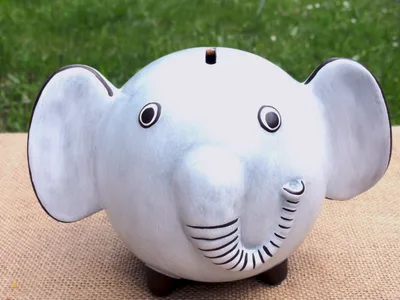 Tirelire éléphant en terre cuite
